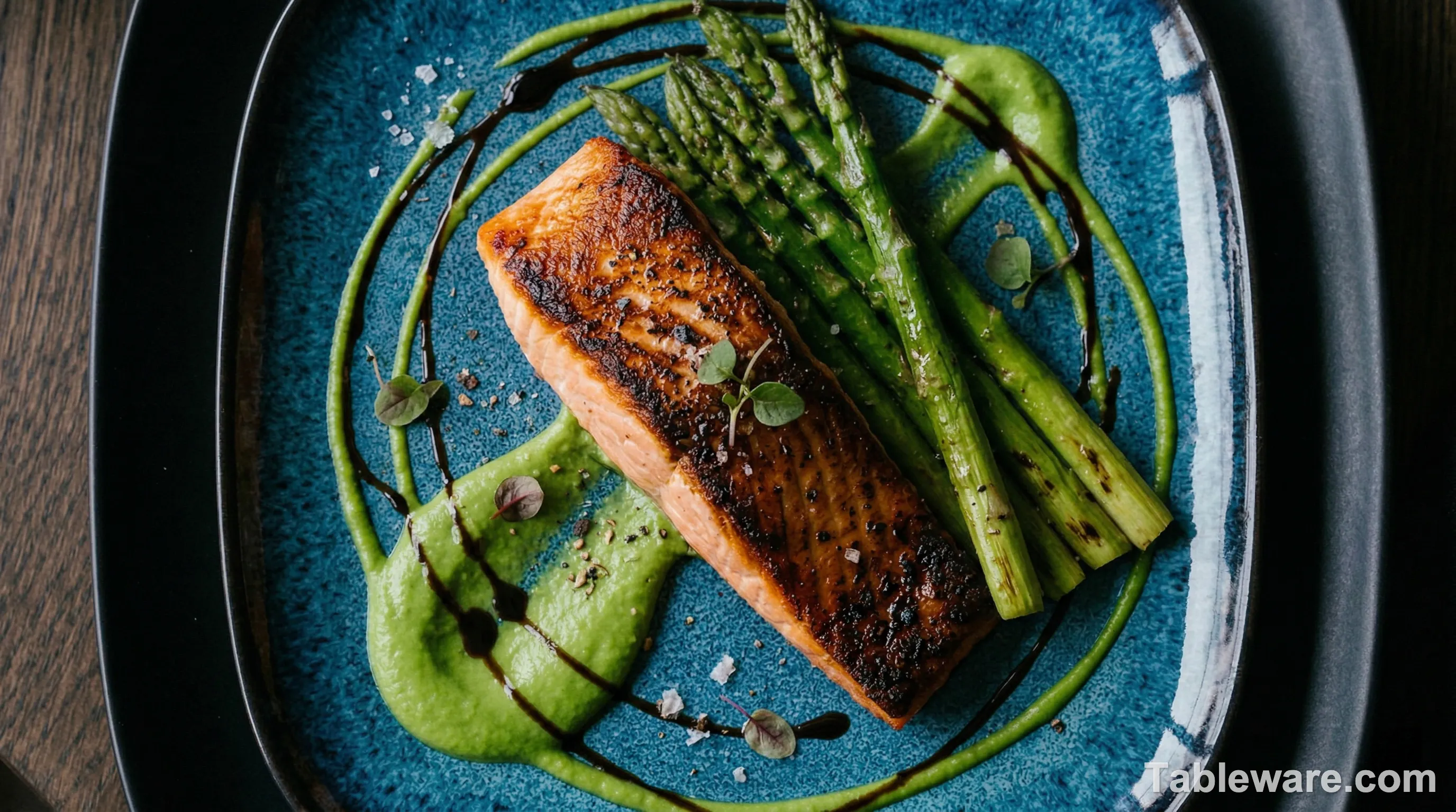 A beautifully plated dish on a dark square Gibson Soho plate, highlighting the contrast.